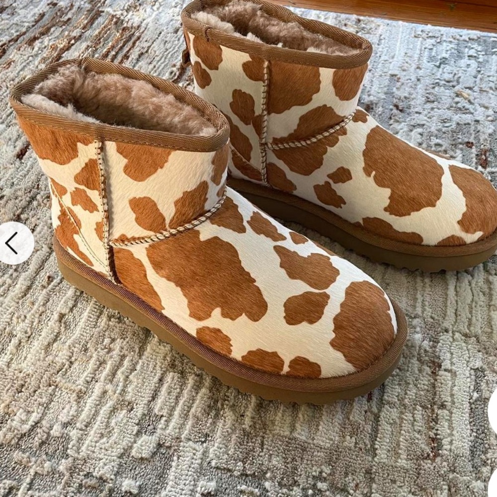 UGGs - used once REAL COW HAIR BOOTS- US SIZE 9 .